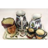 A pair of Losol ware bird and floral jugs plus three character jugs