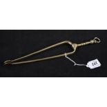 A pair of early 18th Century brass ember tongs with tapering arms,