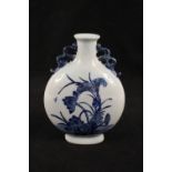 A Chinese blue and white floral moon flask