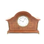 An Edwardian inlaid mahogany mantel clock