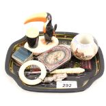 A Carlton ware Guinness toucan, a pottery match striker,