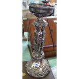 A Victorian silver plated table centre piece on three lady supports