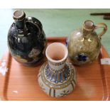 Two Royal Doulton stoneware flagons plus a Mettlach vase