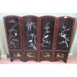A Japanese lacquer four fold screen with mother of pearl bird and floral inlays