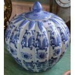 A Chinese blue and white floral segmented lidded jar