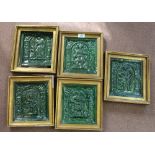 Five framed 16th Century German stove tiles with figure decoration,