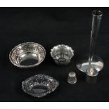 Four small silver dishes,