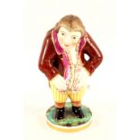 A 19th Century Derby figure of a portly man, Puce mark,