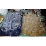 Various cut drinking glasses and sundae dishes (two trays)