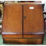 A Victorian mahogany stationery cabinet with calendar