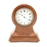 An Edwardian mahogany balloon clock dial marked Lister Horsfall,