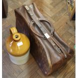 A leather Gladstone bag plus a stoneware flagon