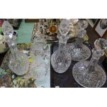 Various cut glass decanters and brandy glasses (two trays)