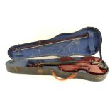 A cased violin and bow