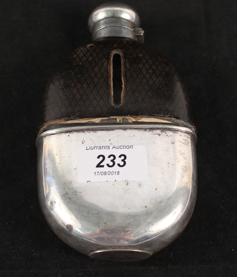 A silver plated hip flask