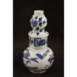 A Chinese blue and white globular and shaped neck vase with carp and floral decoration