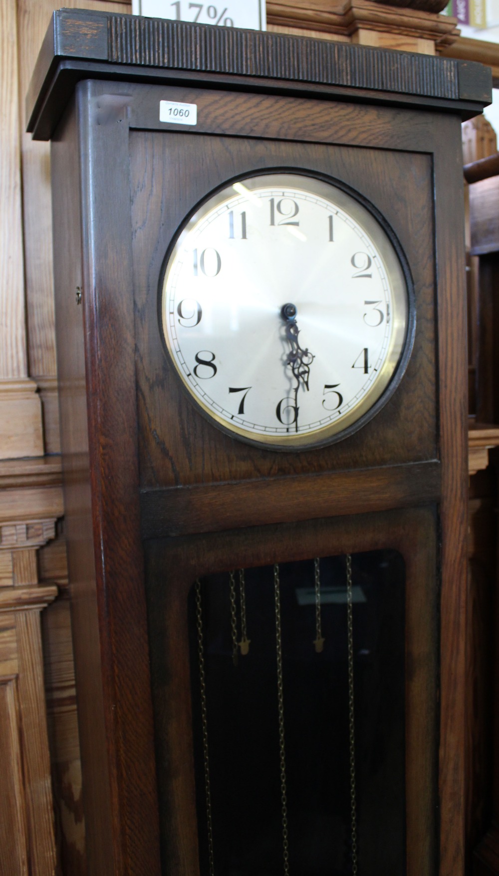 A 1920/30's oak long case clock