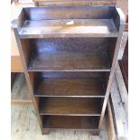 A Victorian mahogany chest of four drawers with turned column decoration and shaped front top