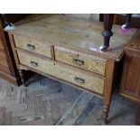 An Edwardian satinwood chest of one long and two short drawers on turned legs