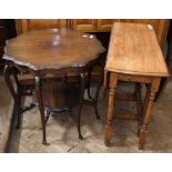 An mahogany reproduction shaped top occasional table with under tier and oak drop leaf table