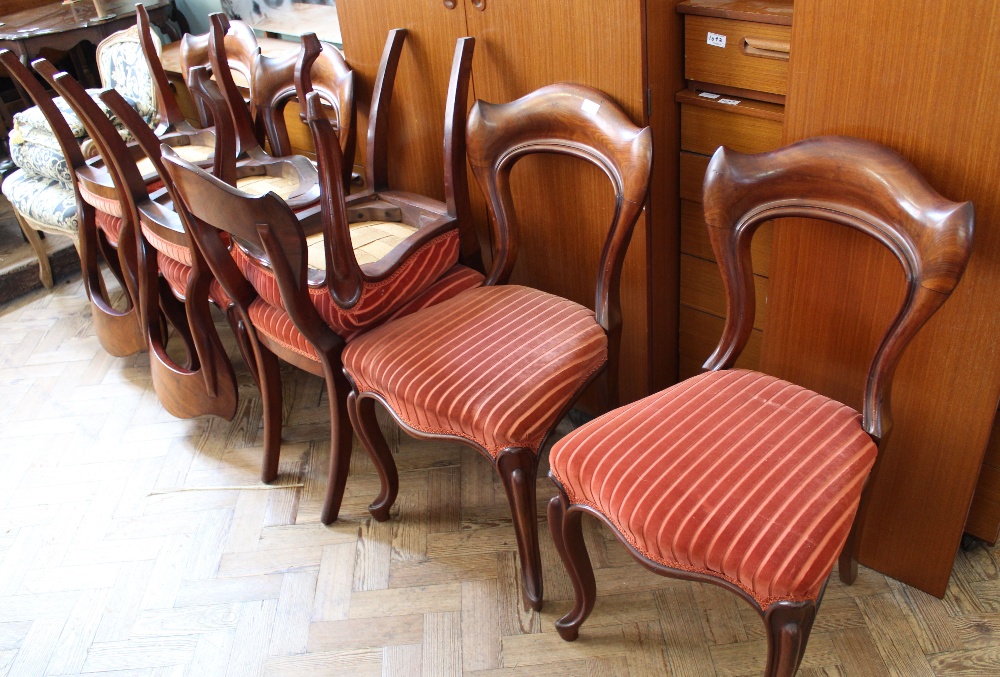 A set of eight Victorian mahogany dining chairs