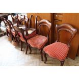 A set of eight Victorian mahogany dining chairs