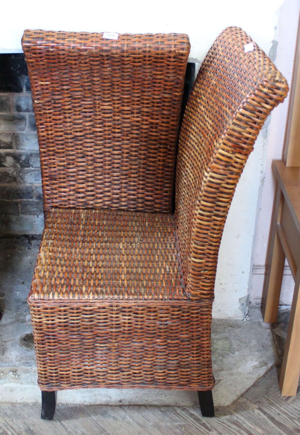 A pair of high back woven cane conservatory chairs