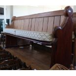 A pitch pine church pew,