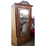 An Edwardian single wardrobe with drawer below