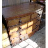 A Victorian bow front mahogany chest of two short and three long drawers