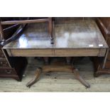 A 19th Century sofa table with twin pedestal supports and two drawers