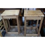 A pair of reclaimed pine tables