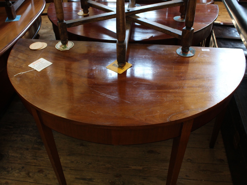 A 19th Century mahogany 'D' end table and a stained pine replica