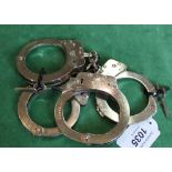 Two pairs of British Police handcuffs by Hiatt (with keys)