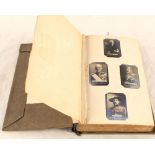 An album of Ogdens Guinea Gold plus other cigarette cards