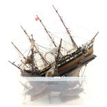 Four various wooden model ships