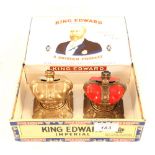 Two cast alloy crown money boxes, one made in England RD No.