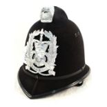 A Police helmet bearing Hampshire insignia plate