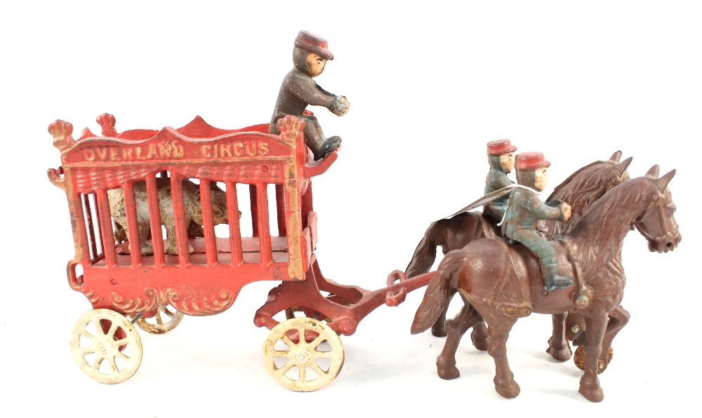 An iron overland circus, two horses,