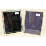 A large silver photo frame,