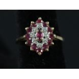 A 9ct gold ruby and diamond cluster ring,