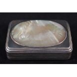 A large Georgian silver table snuff box with oval mother of pearl panel