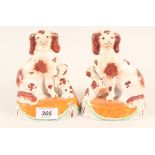 A pair of 19th Century Staffordshire dogs and puppies (as found)