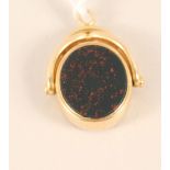 An 18ct gold blood stone and carnelian set swivel fob