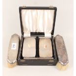 A cased engine turned silver brush set plus two other brushes
