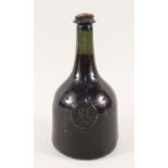 An 18th Century wine bottle of mallet form with seal marked R.