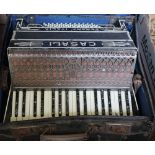 A cased Casali piano accordion