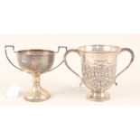 Two silver trophy cups with inscriptions