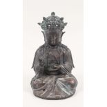 An early Chinese bronze seated Deity,