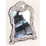 A floral embossed silver photo frame